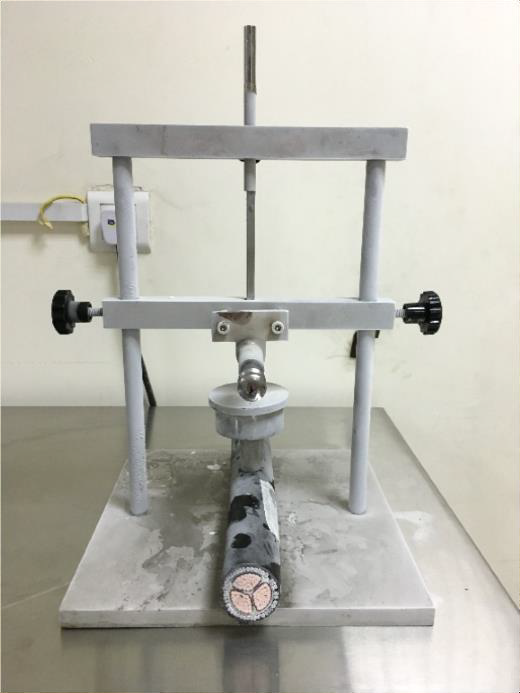 Cold bend and impact test for cables